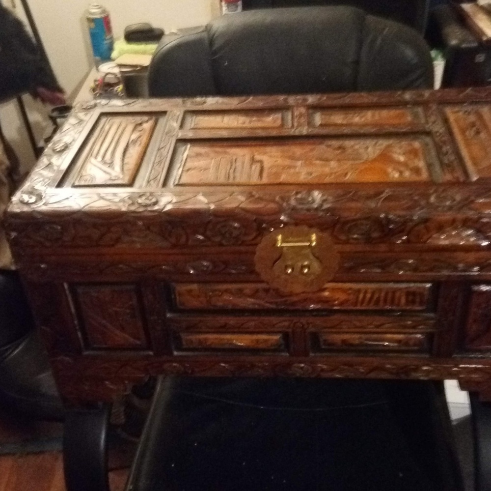 Small hope chest with very nice carving on it